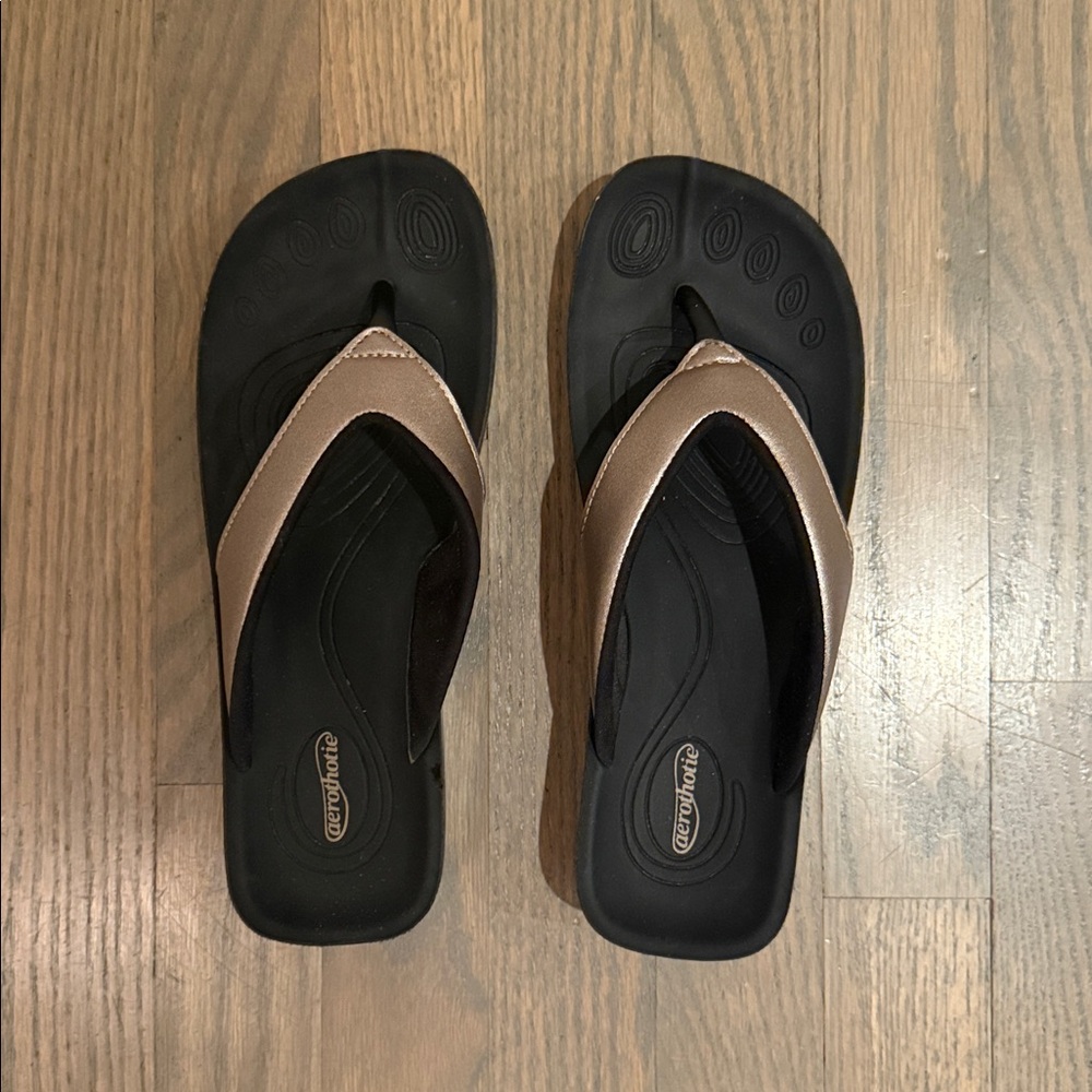 Aerothotic Rider Black and Bronze Flip Flops